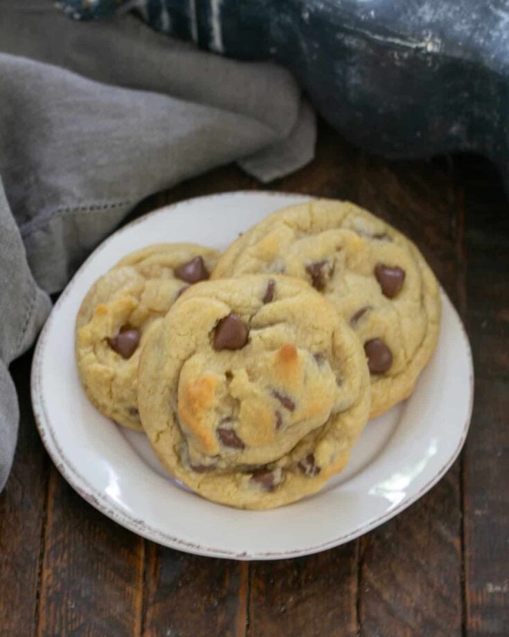 3 Crumbl copycat cookies on a white ceramic plate.