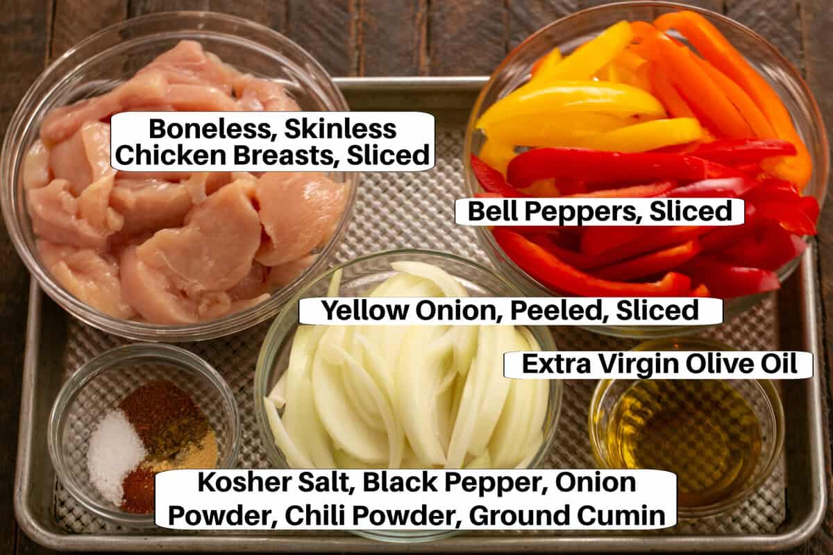 Chicken Fajitas Ingredients with labels on a metal sheet pan.